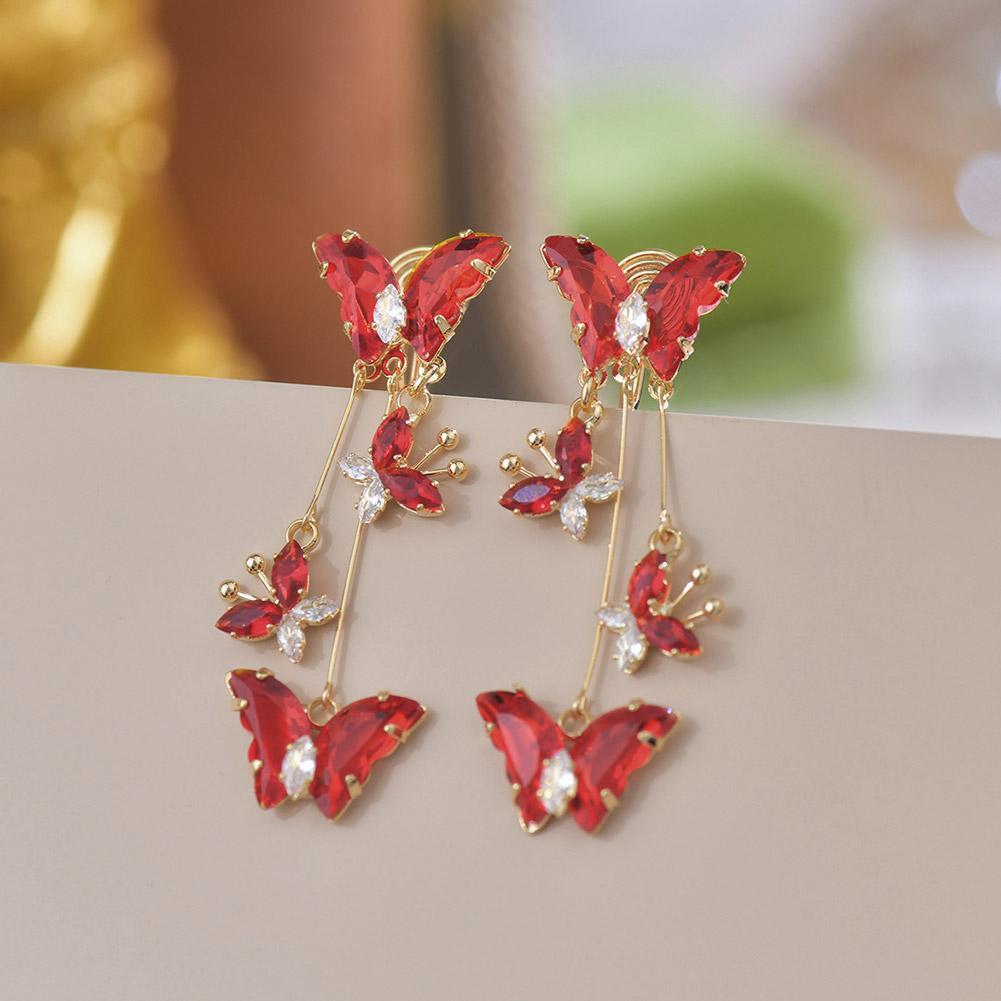 Arete Mariposa Lila 🦋